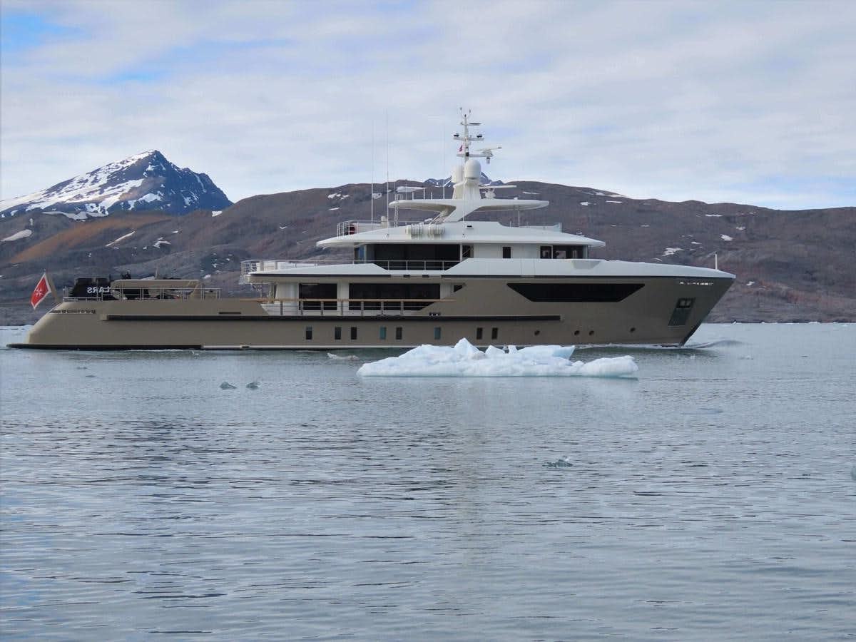 a large ship in the water aboard LARS Yacht for Sale