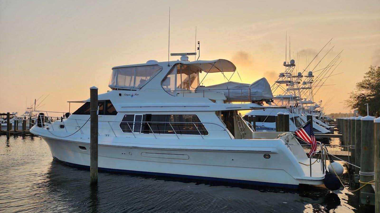 a boat in the water aboard COMPASS ROSE Yacht for Sale