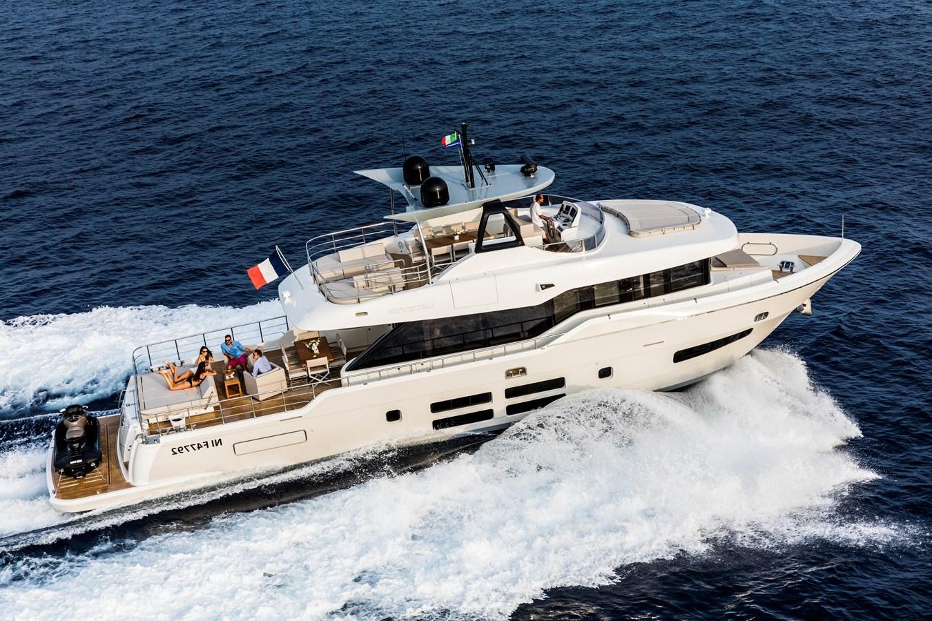 a boat with people on it aboard NEW OCEANIC 76/81 GT Yacht for Sale
