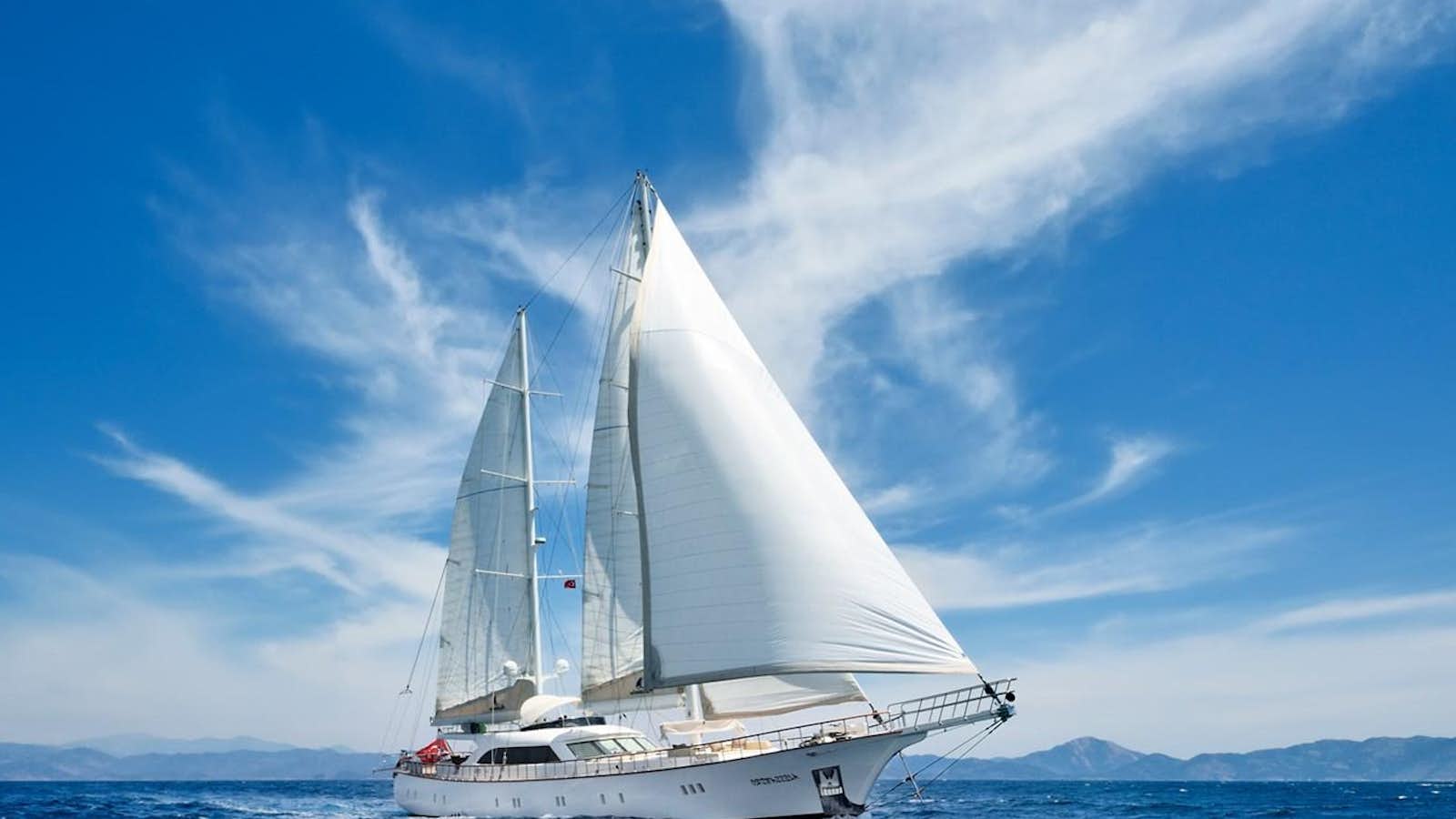 a white boat in the water aboard ALESSANDRO Yacht for Sale