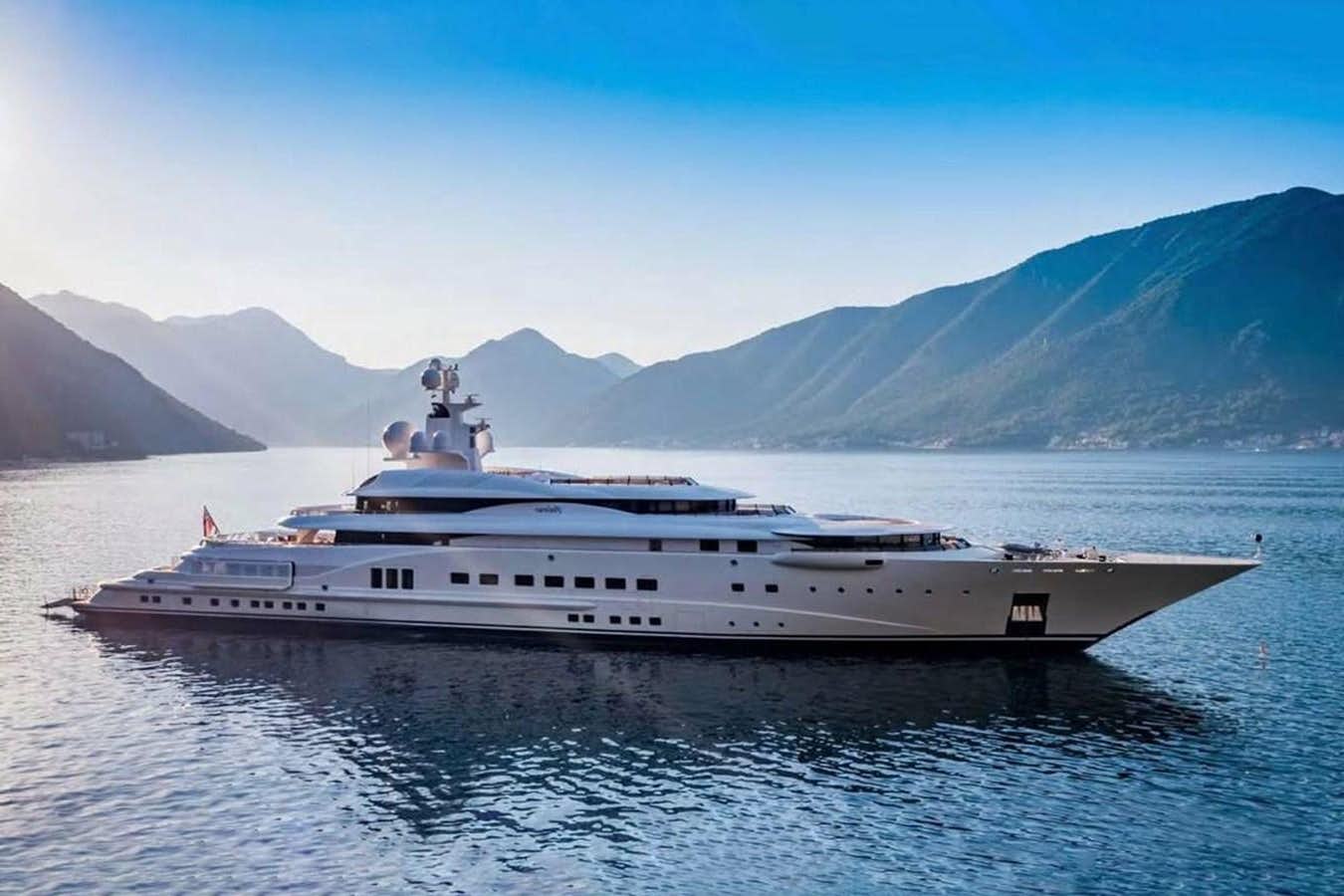 a large white yacht in the water aboard PELORUS Yacht for Sale