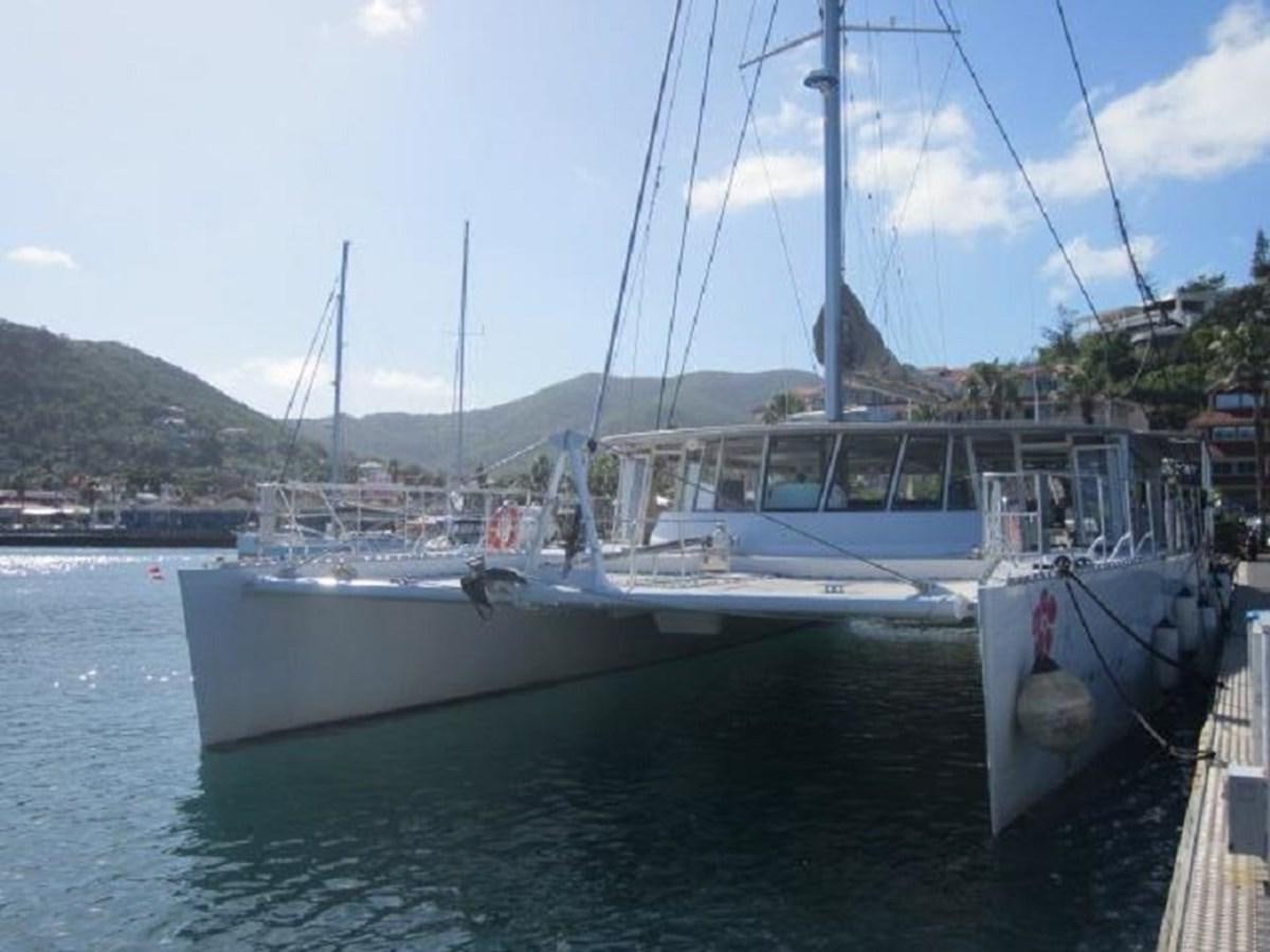 a boat docked at a pier aboard ECOLORATO Yacht for Sale