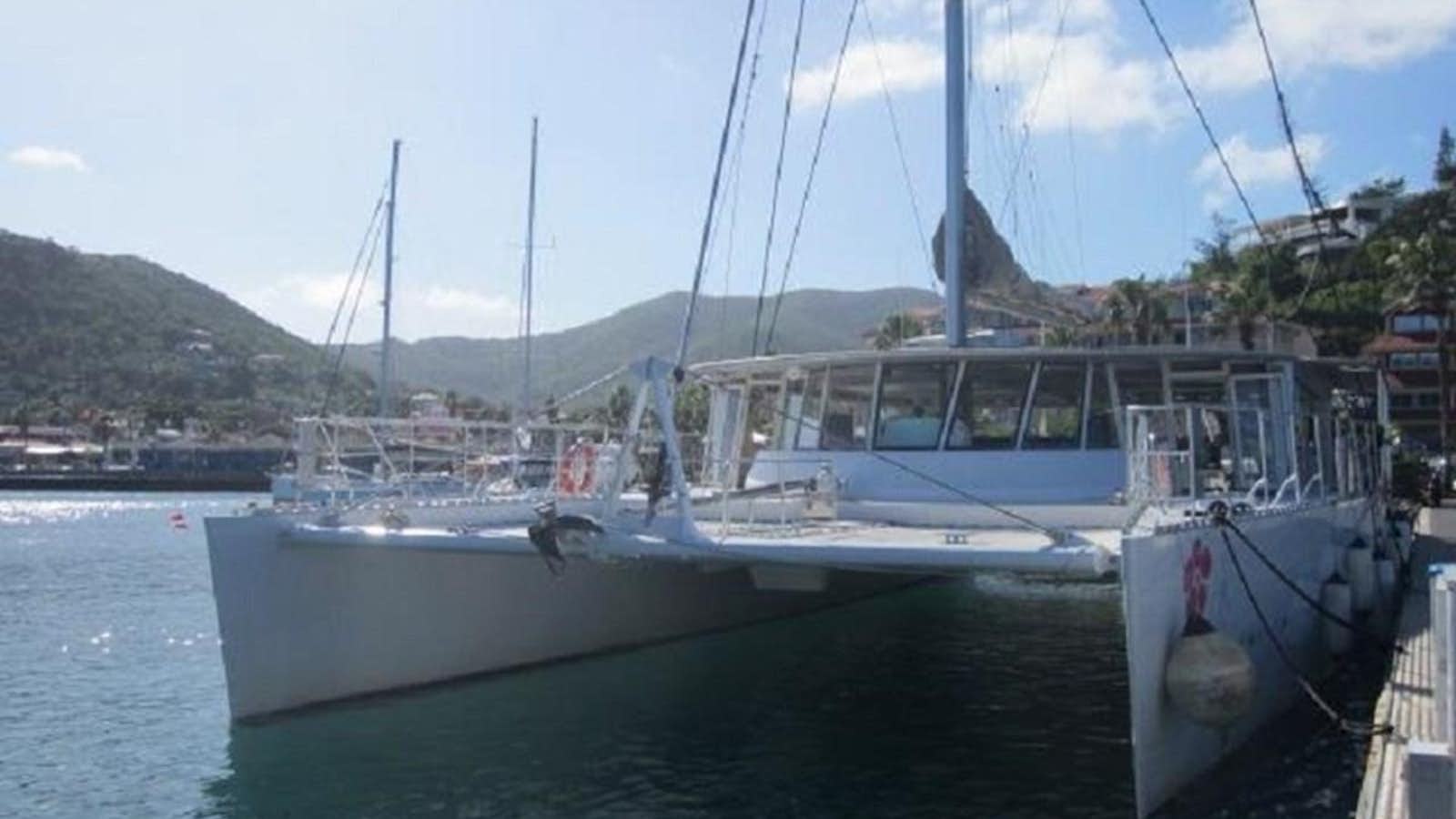 a boat docked at a pier aboard ECOLORATO Yacht for Sale