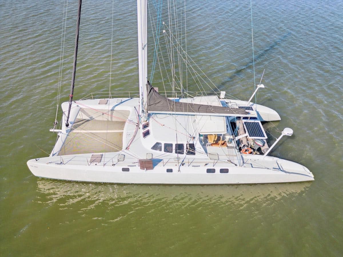 a boat sailing on the sea aboard COOL CAT Yacht for Sale