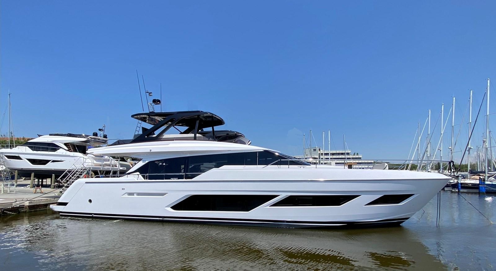 a white yacht in a harbor aboard MY ANGEL Yacht for Sale