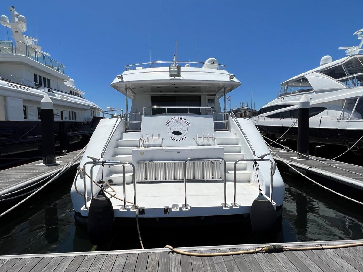 a large white boat sits in a harbor aboard BENSHIP 101 Yacht for Sale