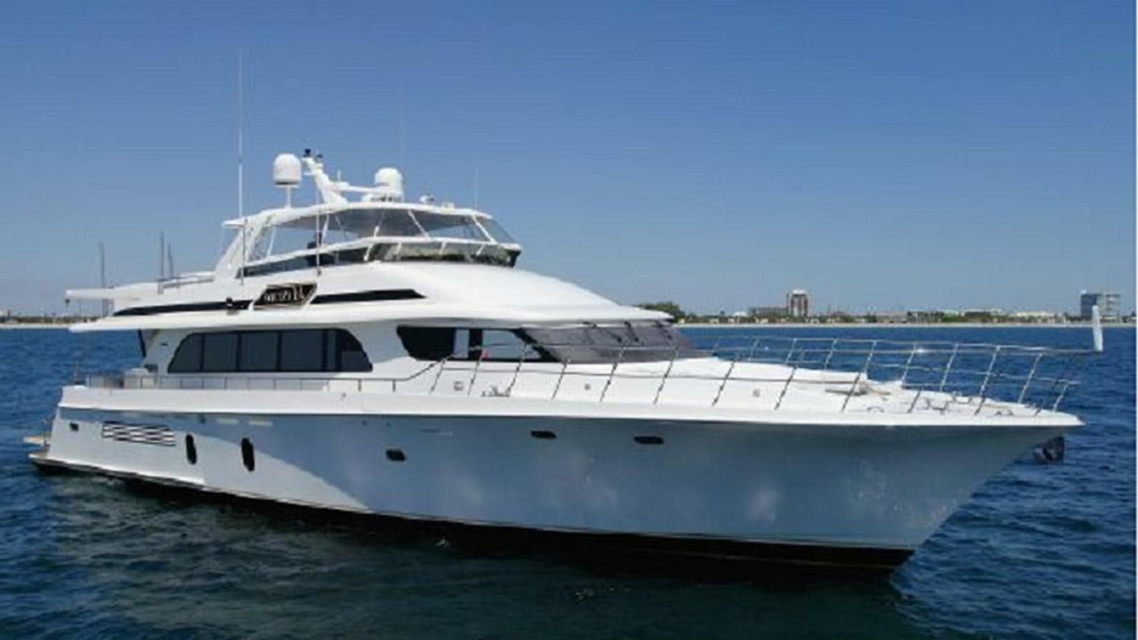 a white yacht in the water aboard 2006 CHEOY LEE MOTOR Yacht for Sale