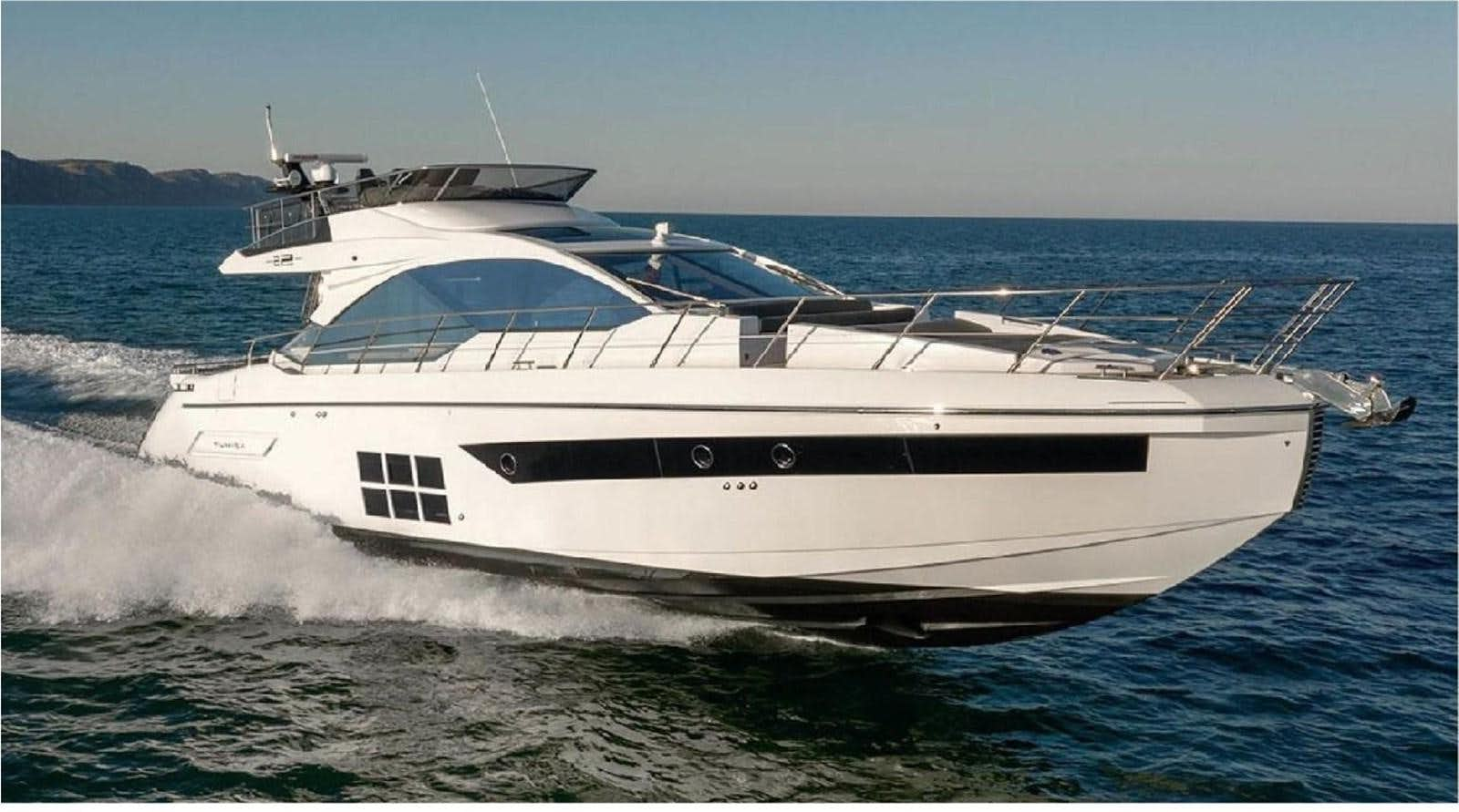 a white yacht on the water aboard AZIMUT S6 SPORTSFLY Yacht for Sale