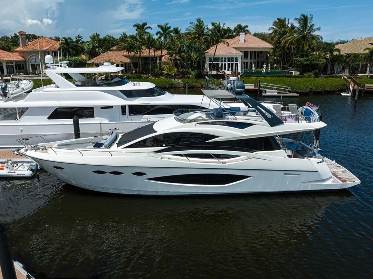 a group of boats in a harbor aboard XHALE Yacht for Sale