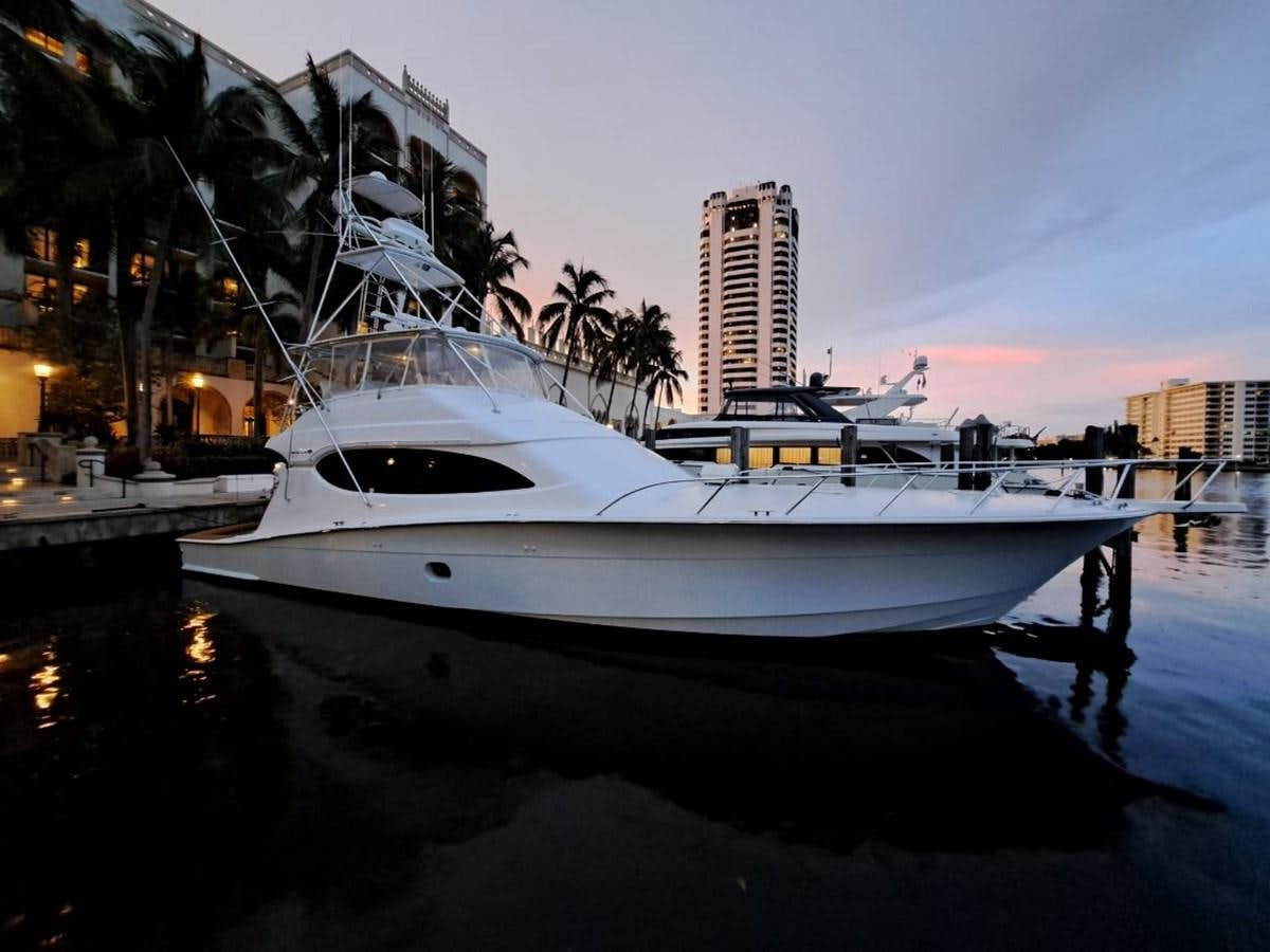 a boat parked on the water aboard CLAIRE TOO Yacht for Sale