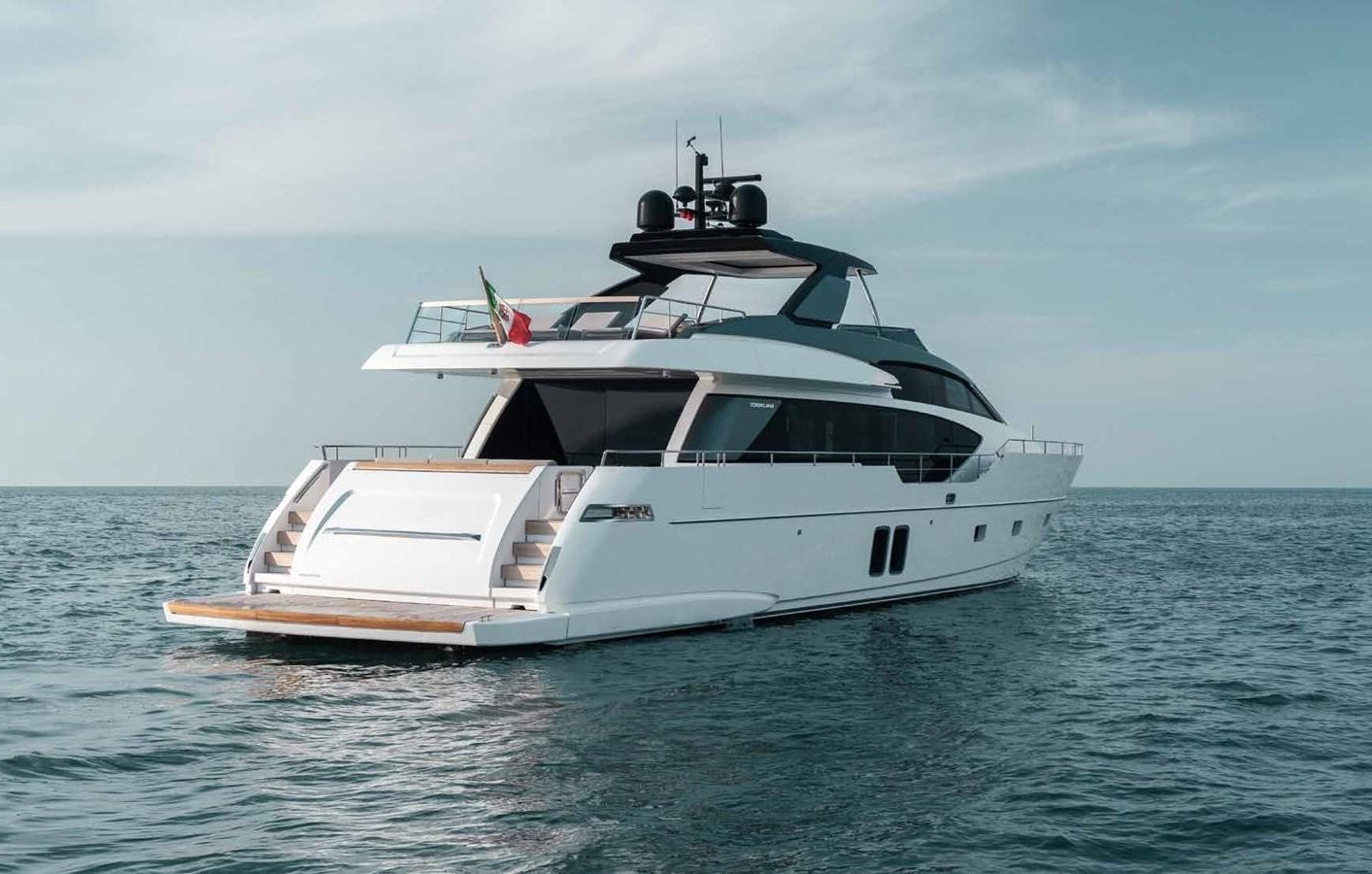 a white yacht in the water aboard 2017 SANLORENZO SL86 # 676 Yacht for Sale