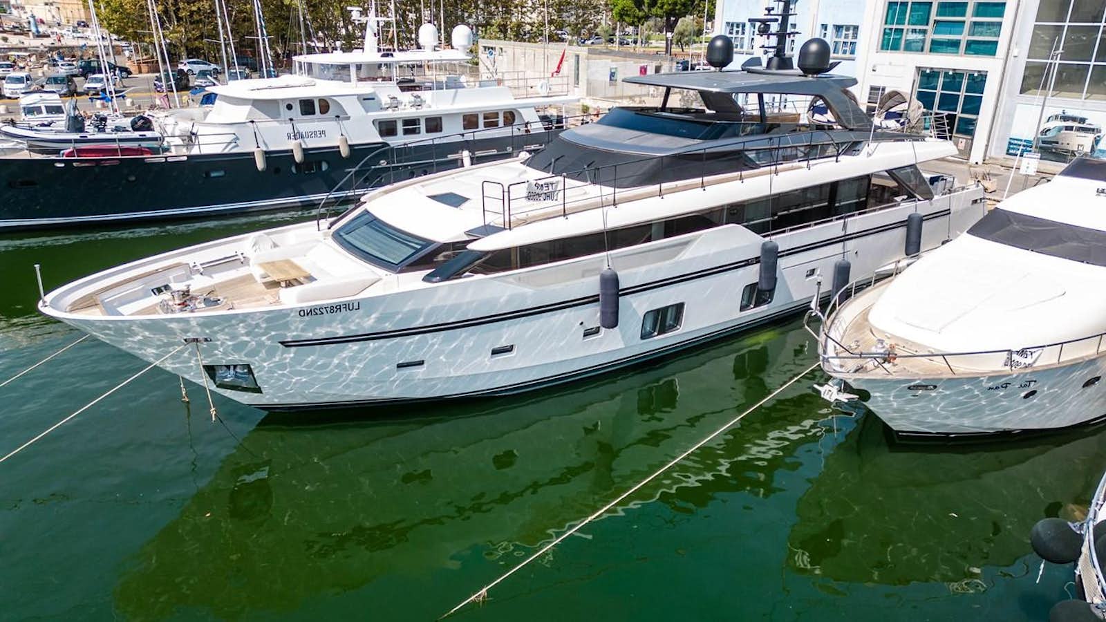 a group of boats are parked in a harbor aboard VISSOTTA Yacht for Sale