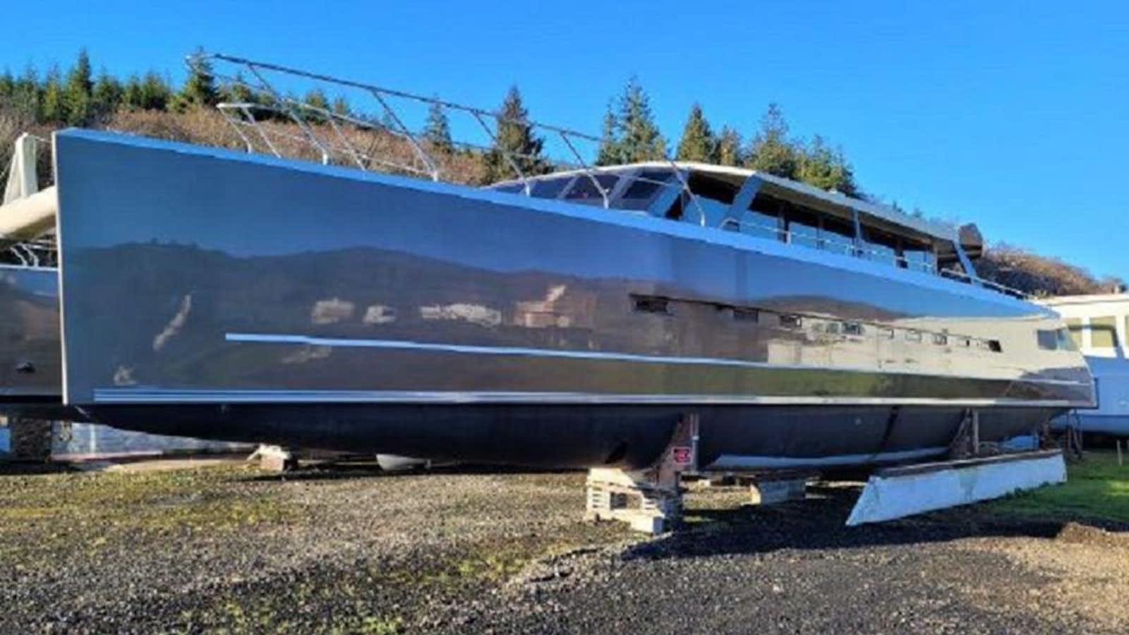 a large airplane on a field aboard 2023 PDIGREE CAT BLOOMFIELD Yacht for Sale
