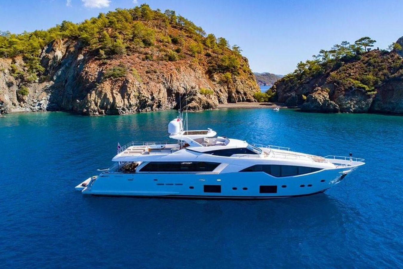 a boat on the water aboard CUSTOM LINE  97 Yacht for Sale
