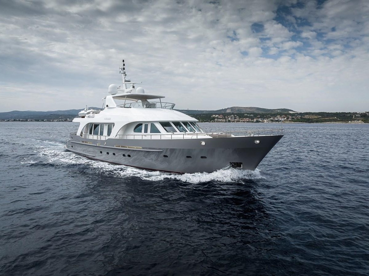a white boat on the water aboard NASHIRA Yacht for Sale