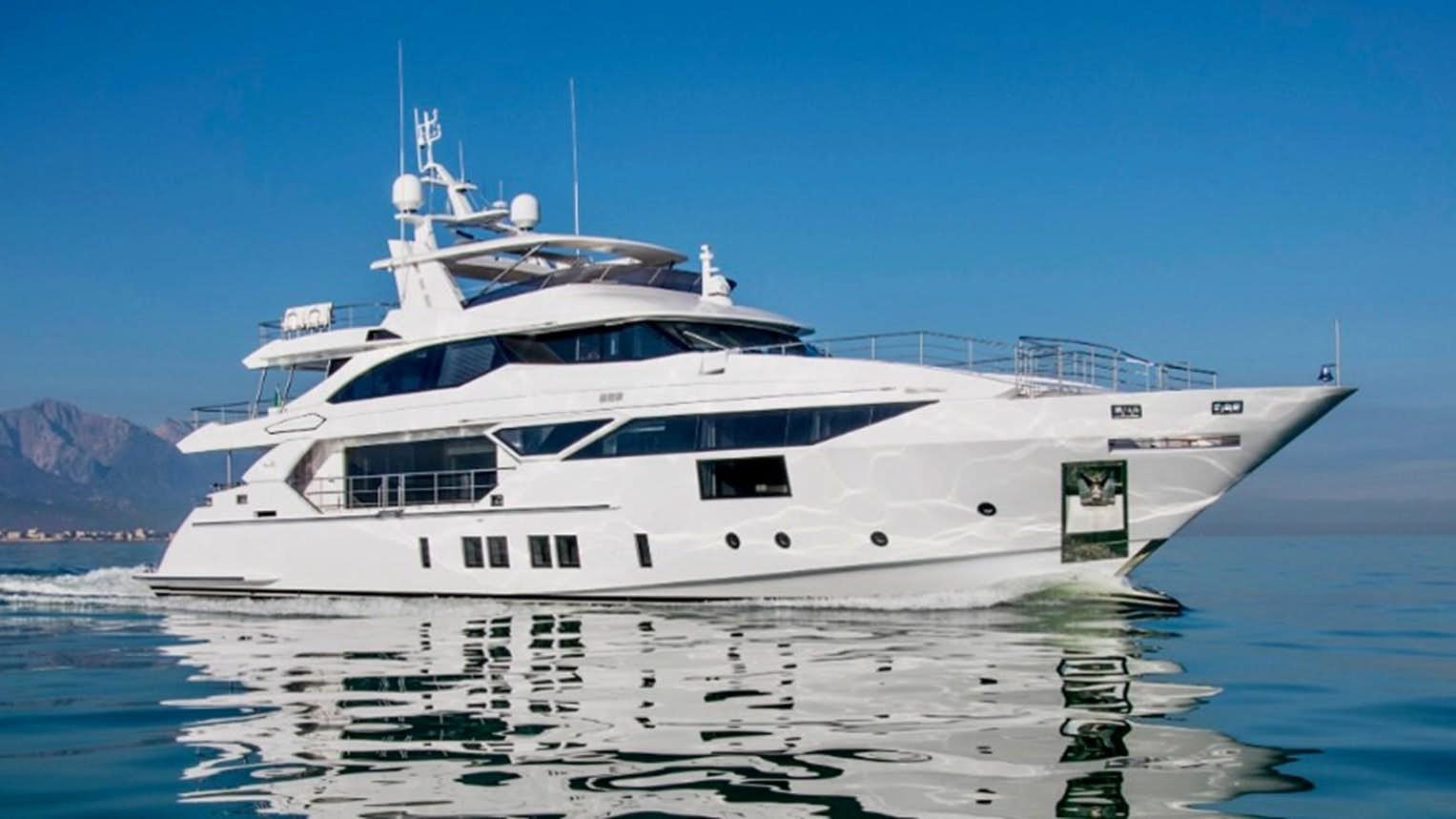 a white yacht in the water aboard O3 Yacht for Sale