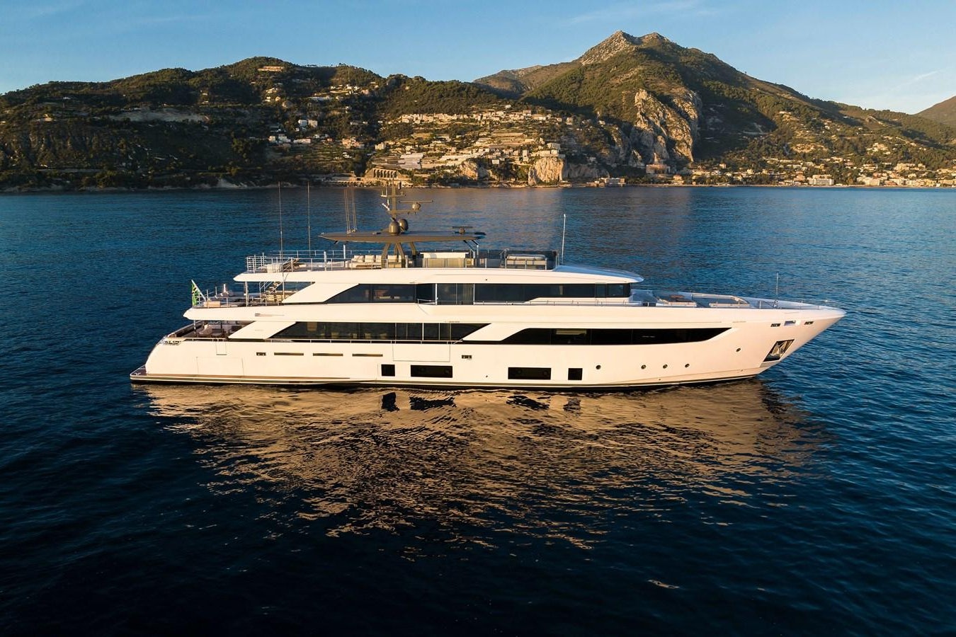a white yacht in the water aboard REGINA Yacht for Sale
