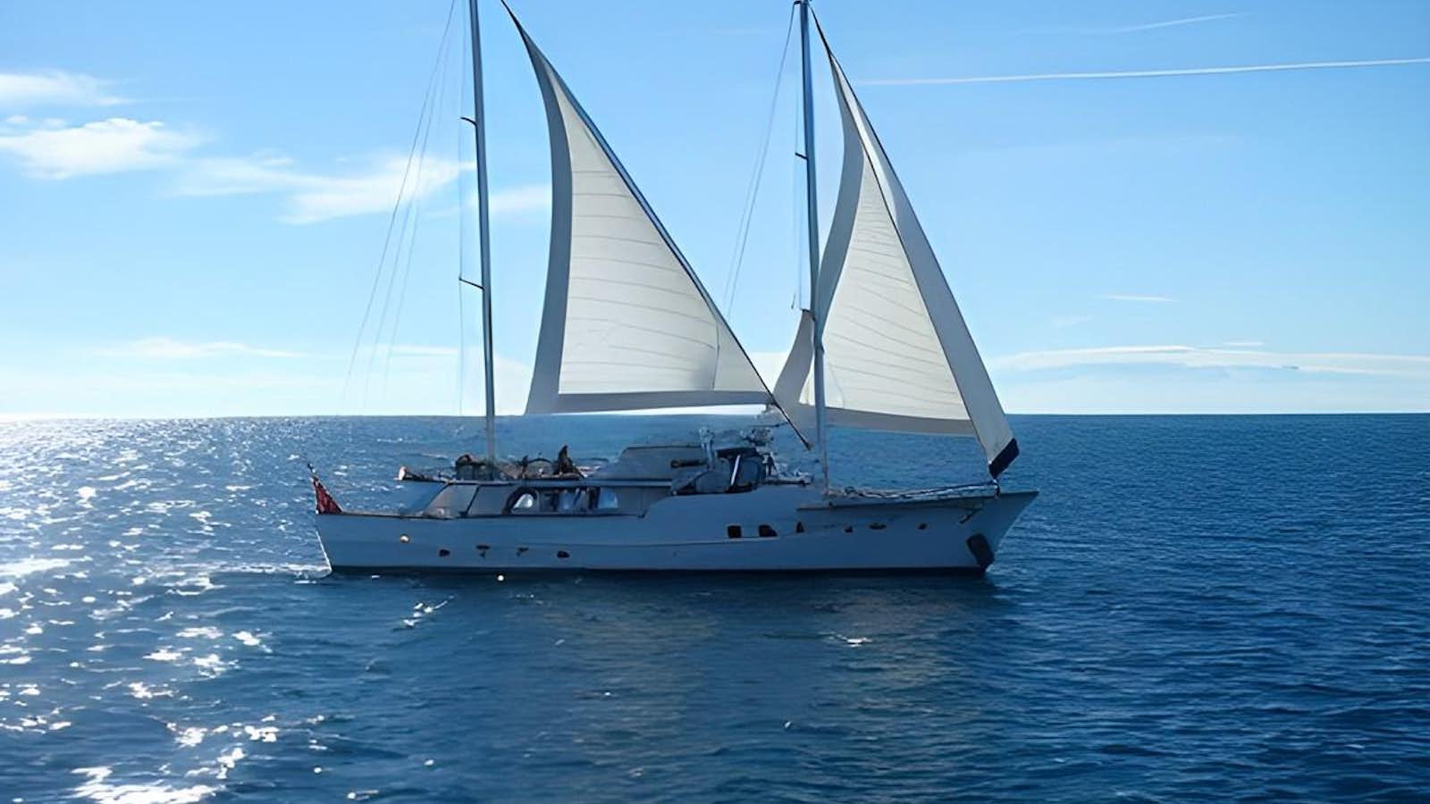 a sailboat on the water aboard COLUMBUS Yacht for Sale