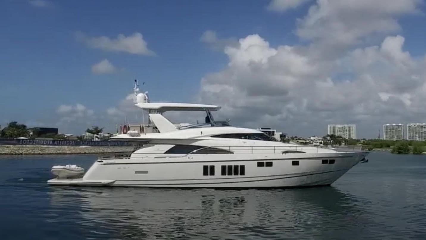 a white yacht on the water aboard SQUADRON 78 CUSTOM Yacht for Sale