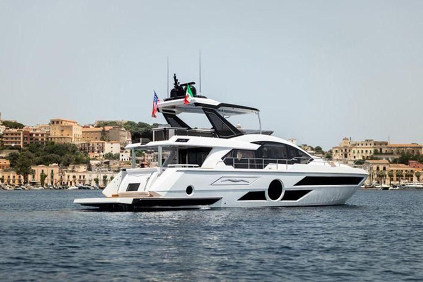 a boat on the water aboard AICON 66 VIVERE Yacht for Sale