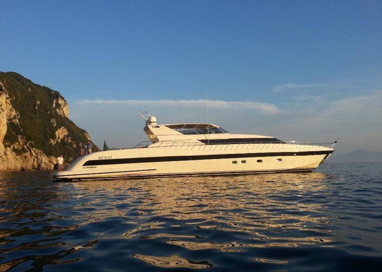 a white yacht on the water aboard VARUNA Yacht for Sale