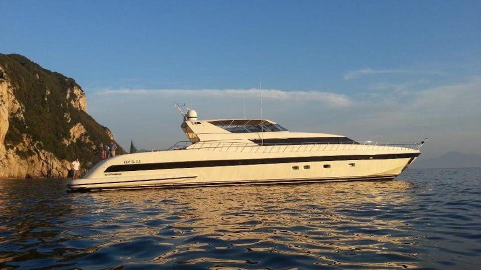 a white yacht on the water aboard VARUNA Yacht for Sale