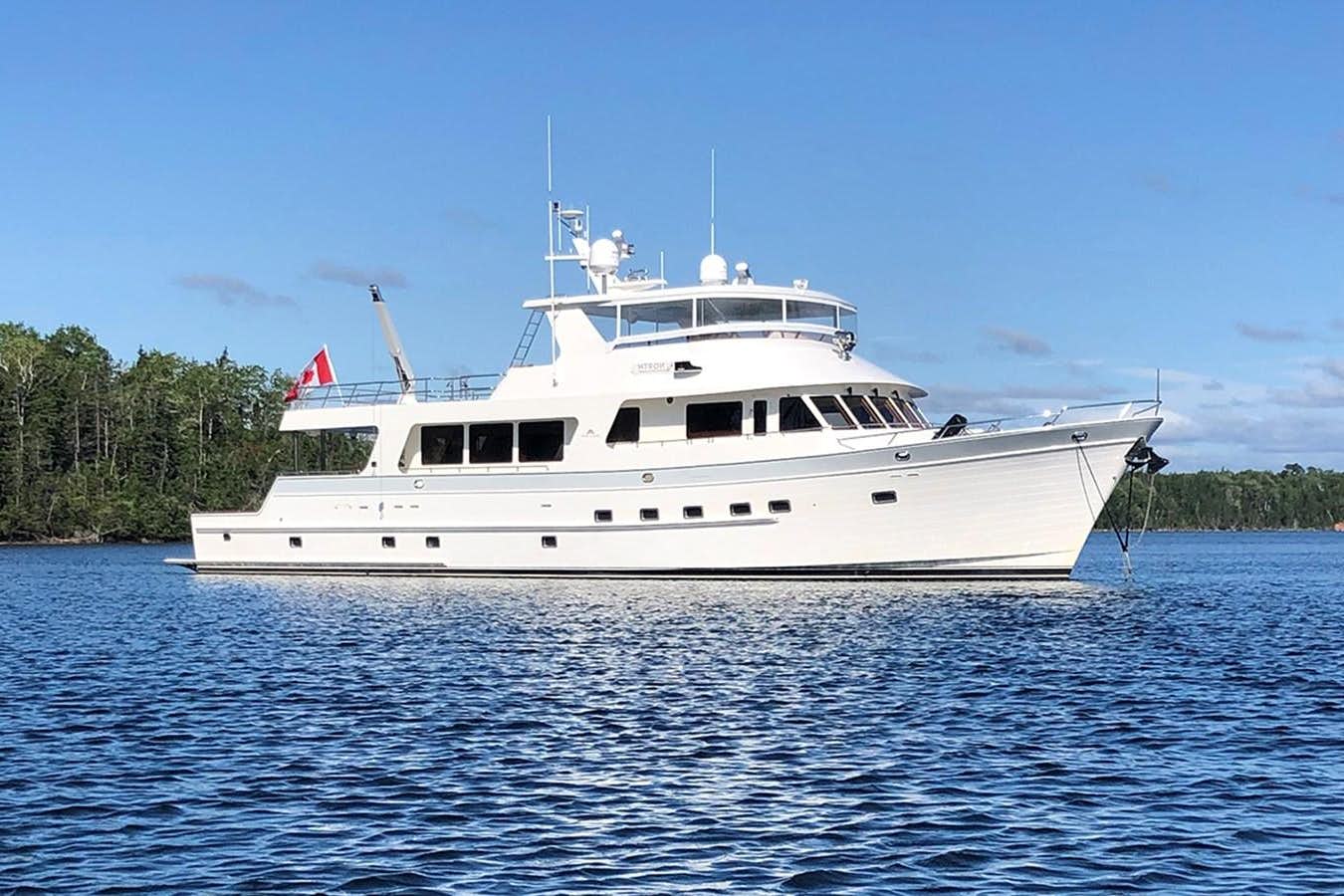 a large white boat in the water aboard 44 NORTH Yacht for Sale