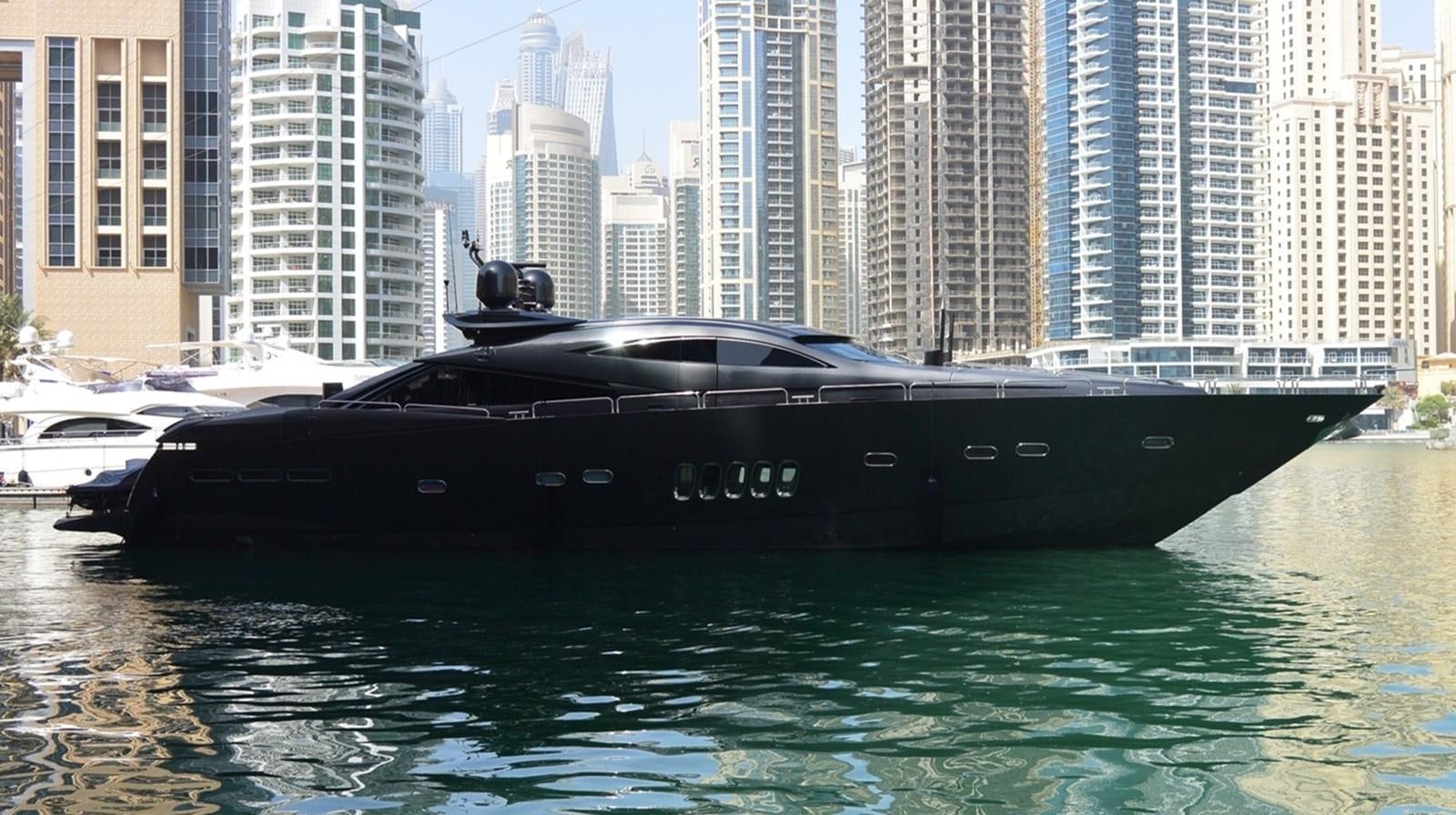 a black boat on water aboard 2004 SUNSEEKER PREDATOR 95 Yacht for Sale
