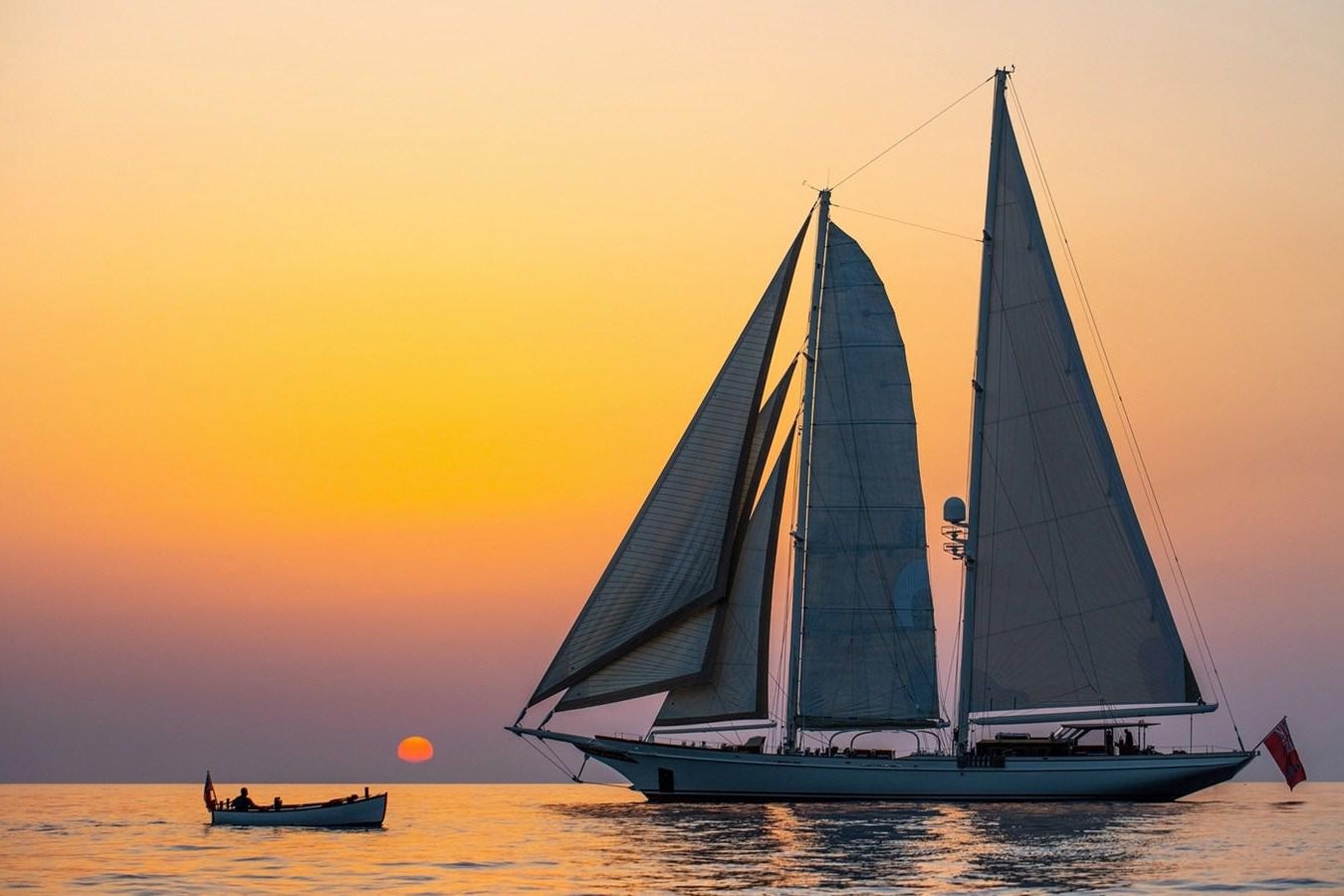 a sailboat on the water aboard LETHANTIA Yacht for Sale