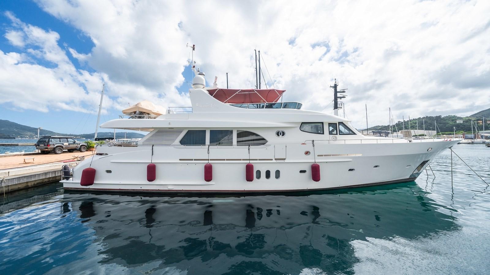 a white yacht docked aboard JASMINE LUNA Yacht for Sale