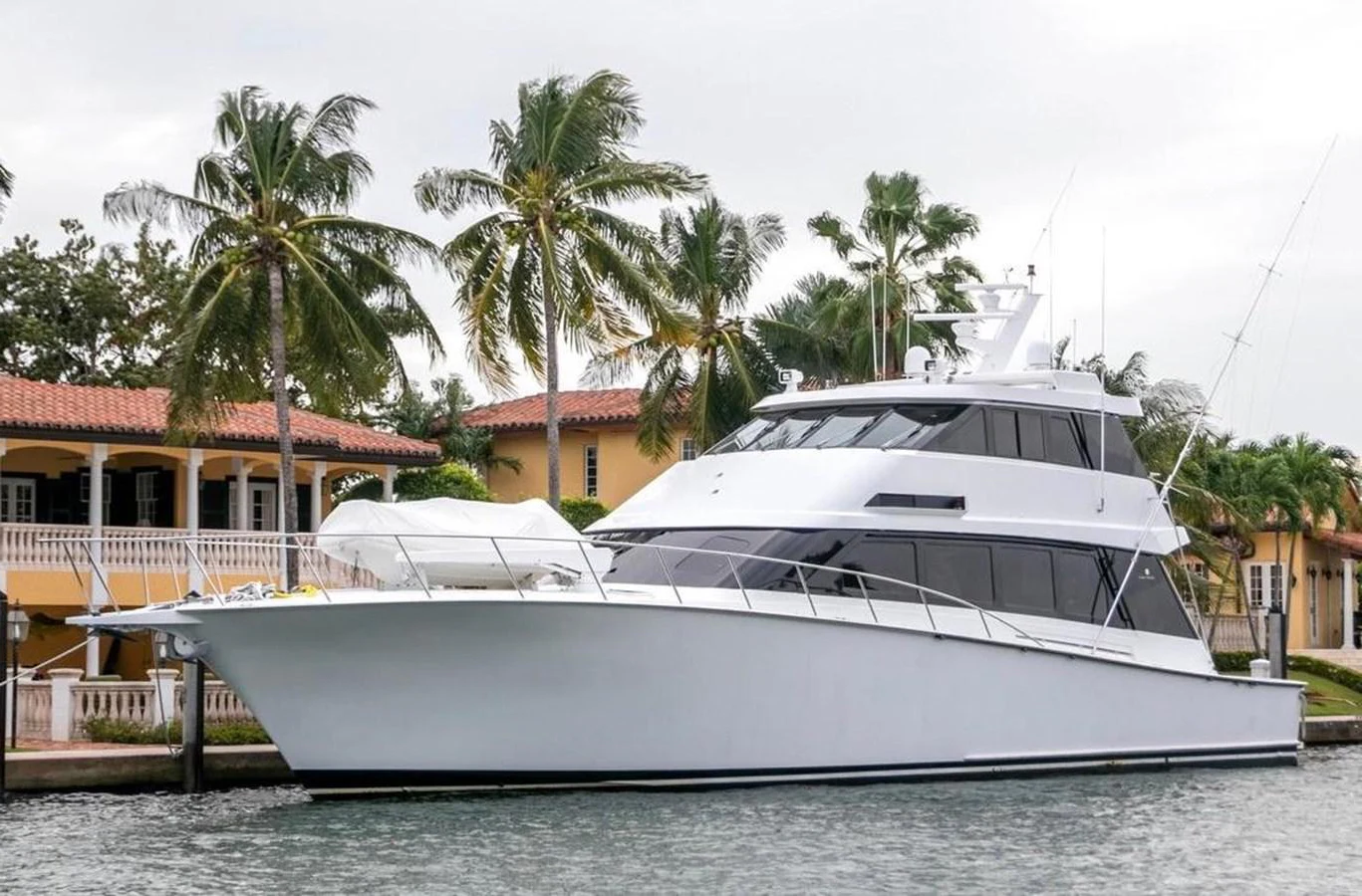 a boat docked at a pier aboard CHAIRMAN Yacht for Sale