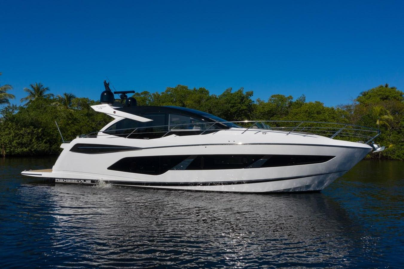 a boat on the water aboard SUNSEEKER 55 PREDATOR Yacht for Sale