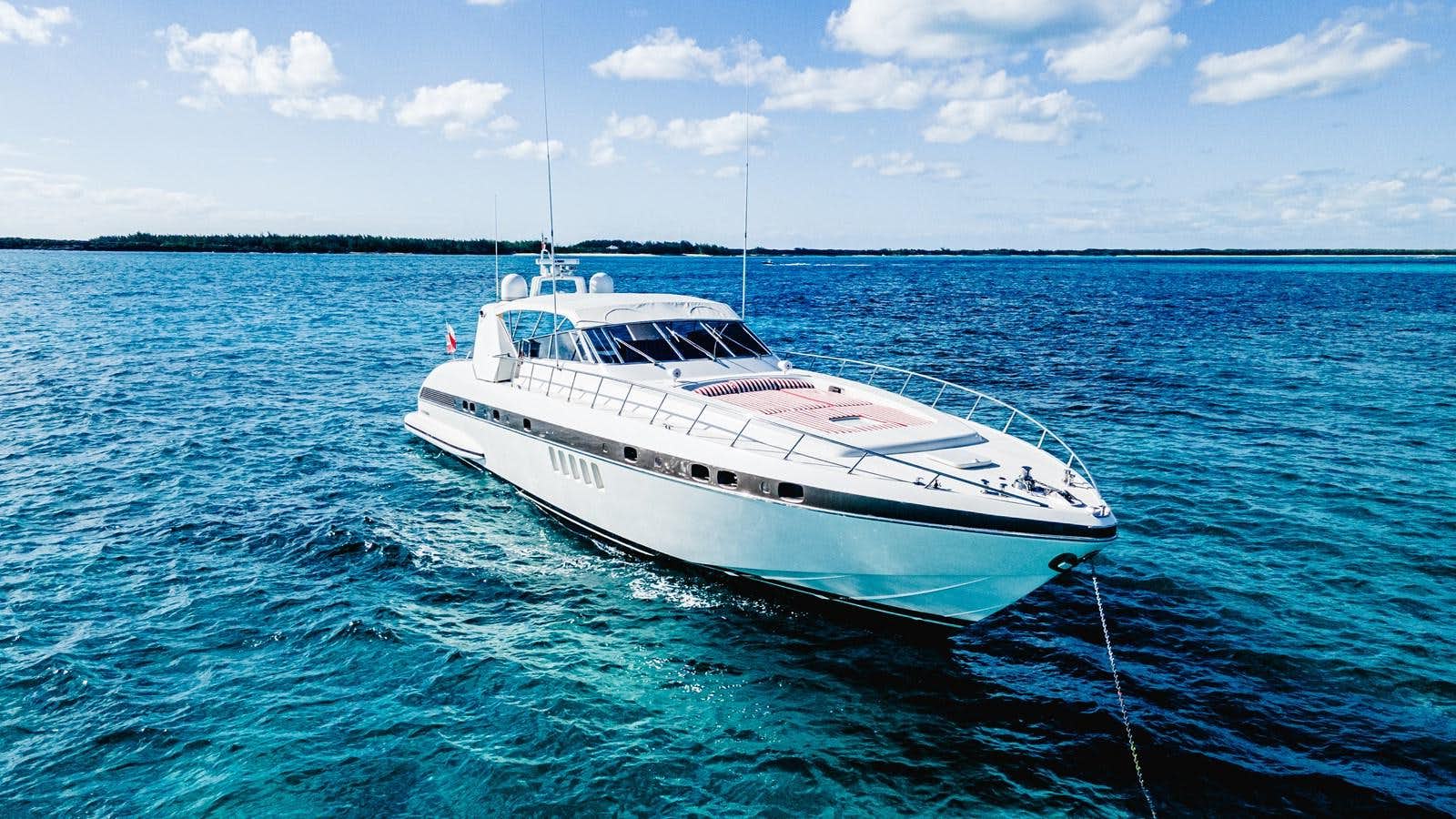 a white boat in the water aboard ROYAL ROCKSTAR Yacht for Sale