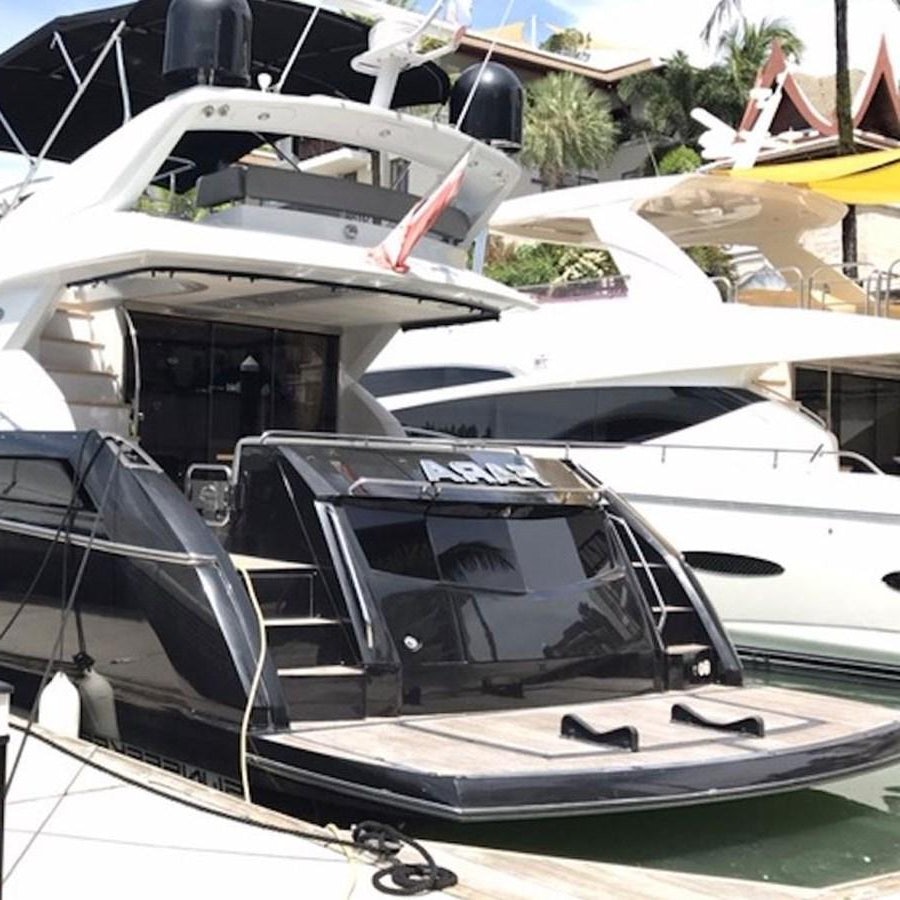 a row of white yachts aboard 2012 SUNSEEKER MANHATTAN 63 Yacht for Sale