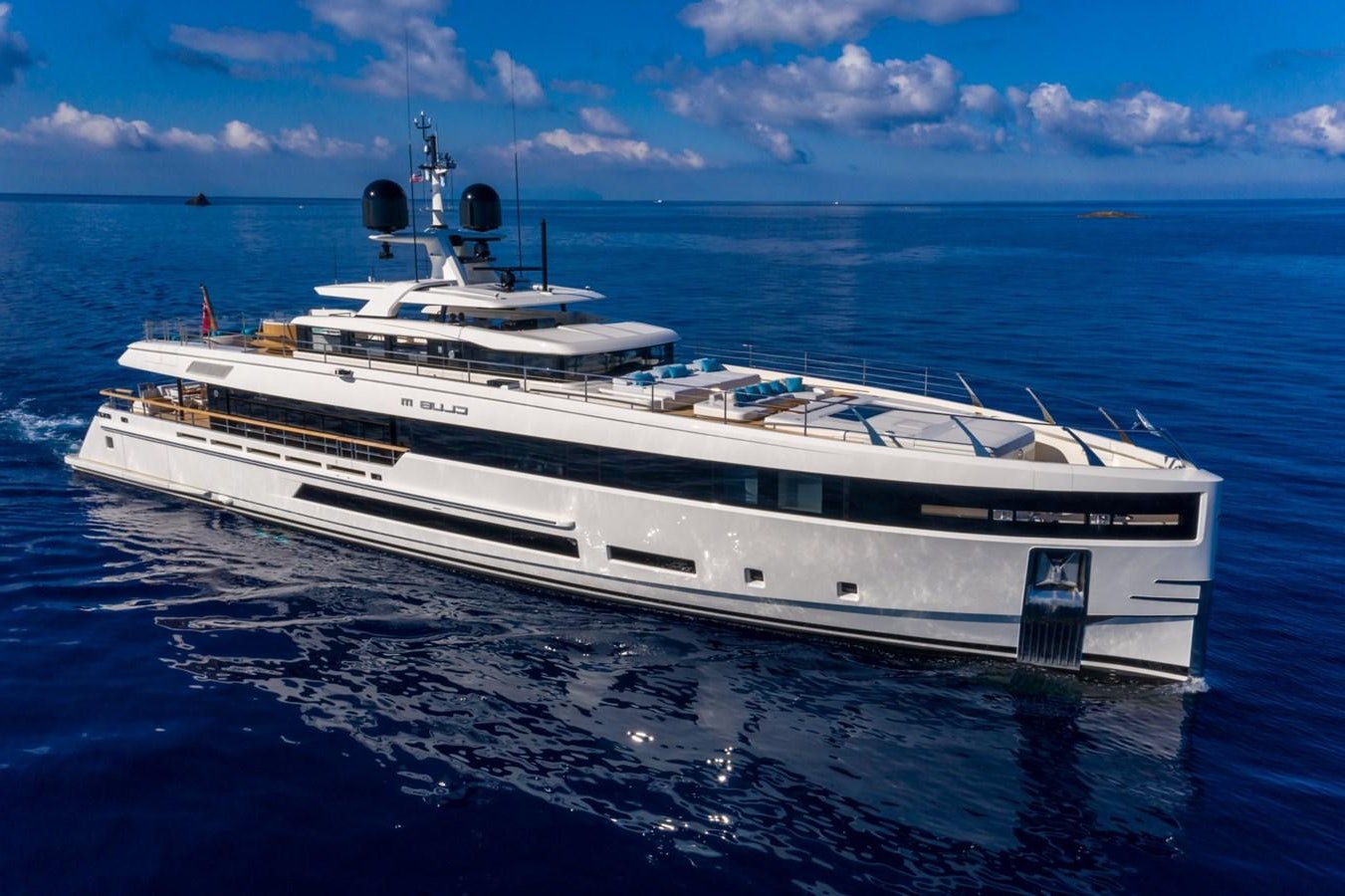 a large white yacht in the water aboard CLUB M Yacht for Sale