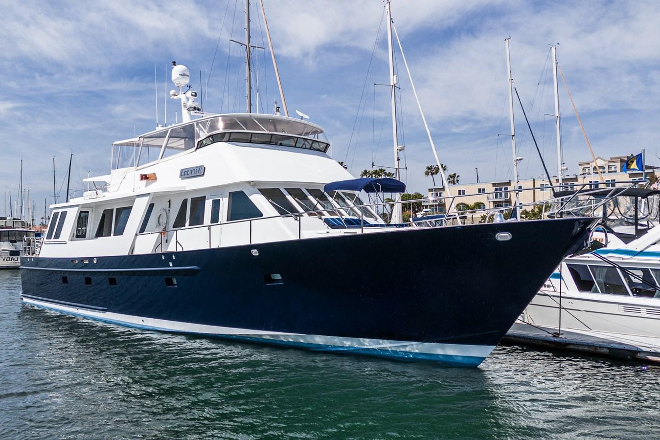 a large white boat in the water aboard NIRVANA Yacht for Sale