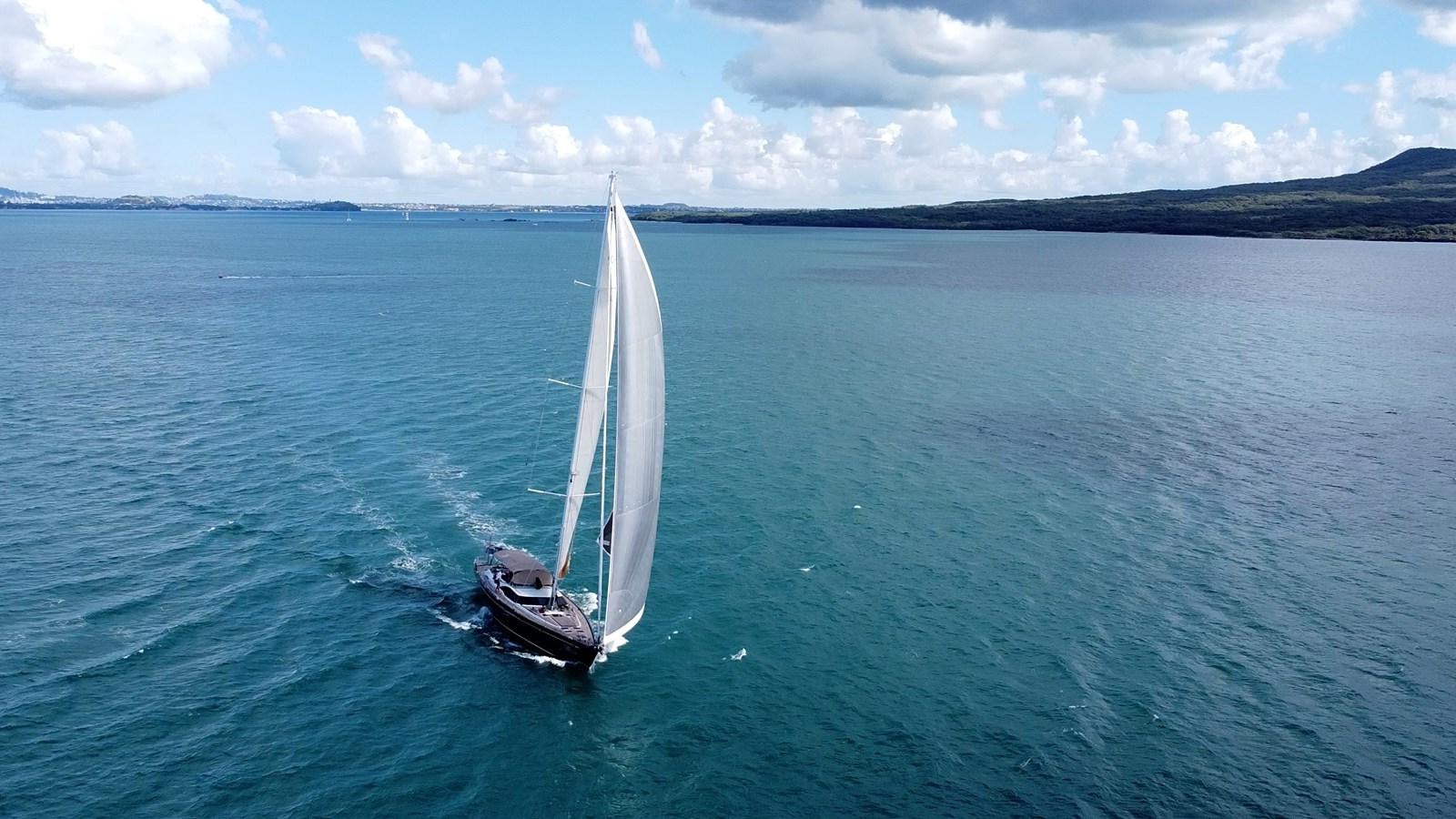a sailboat on the water aboard CRAZY HORSE Yacht for Sale