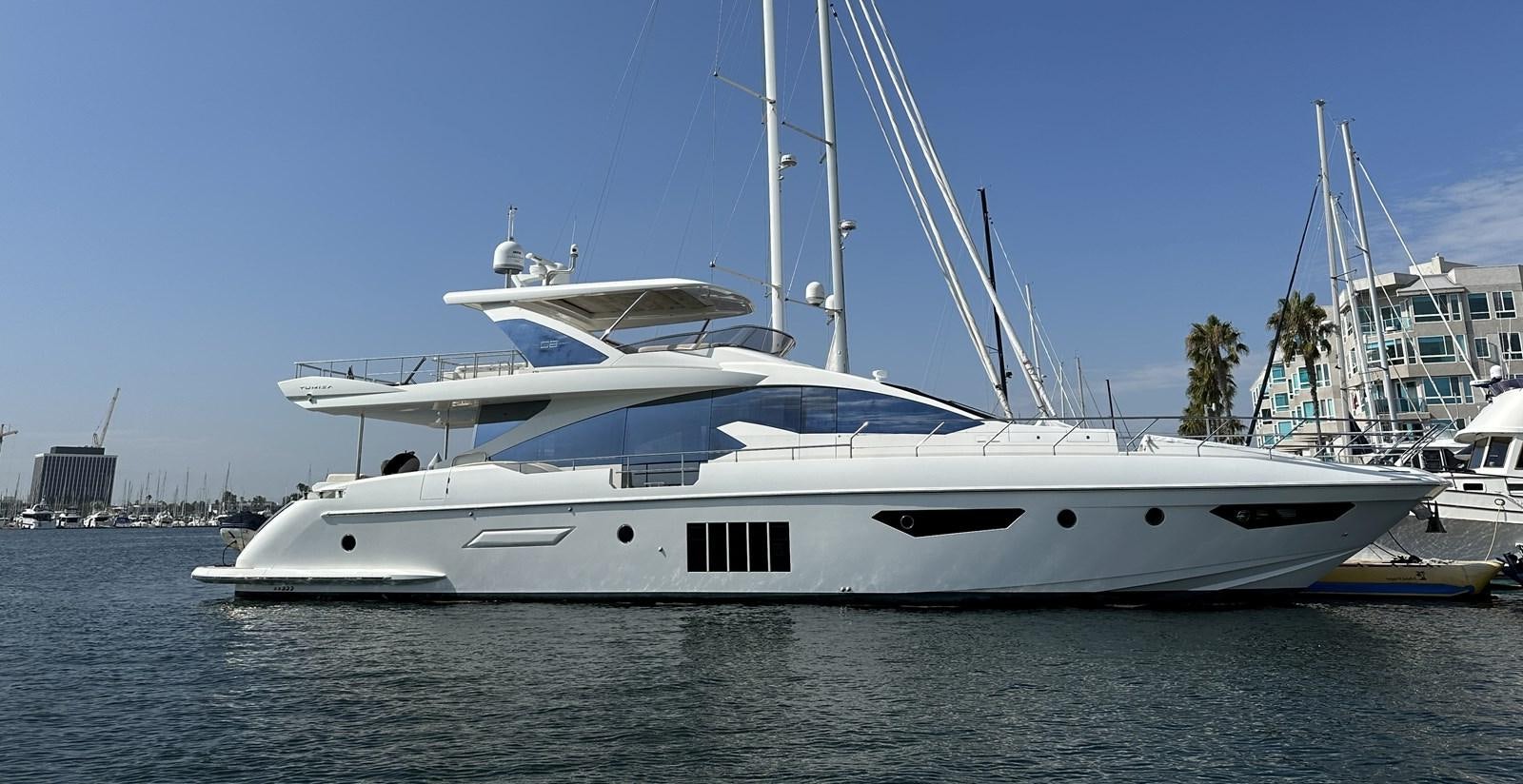 a couple of boats in the water aboard SLINGSHOT Yacht for Sale