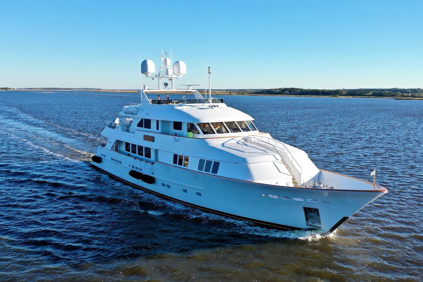 a large white boat in the water aboard ARETI I Yacht for Sale