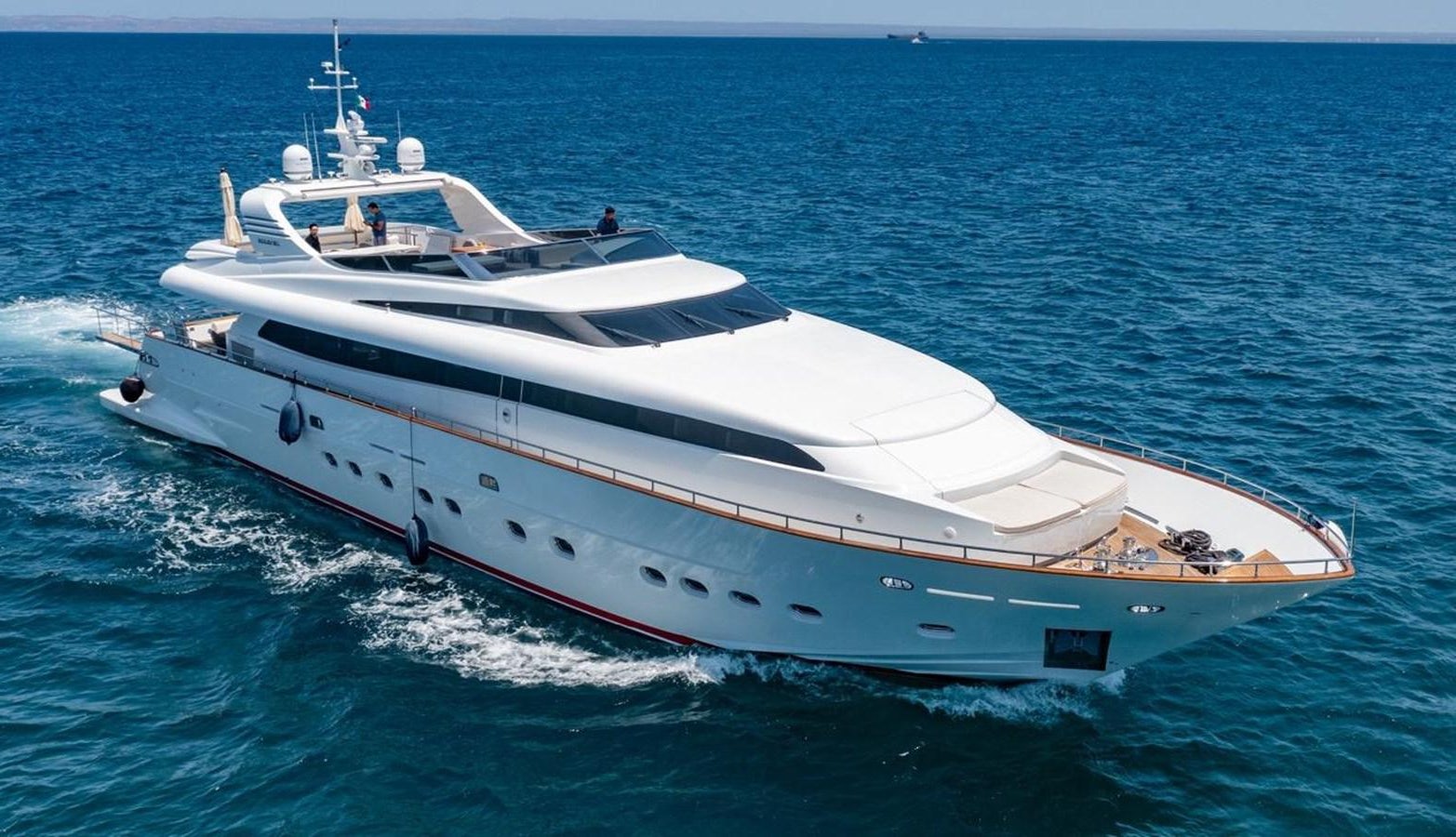 a white boat in the water aboard CANADOS FLYBRIDGE FAST Yacht for Sale