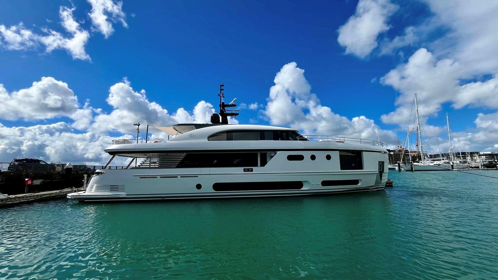 a white yacht in the water aboard DB Yacht for Sale