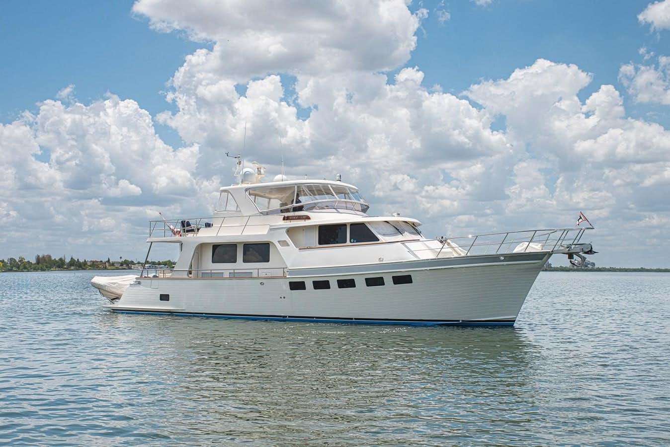 a white boat on the water aboard TRUE NORTH Yacht for Sale