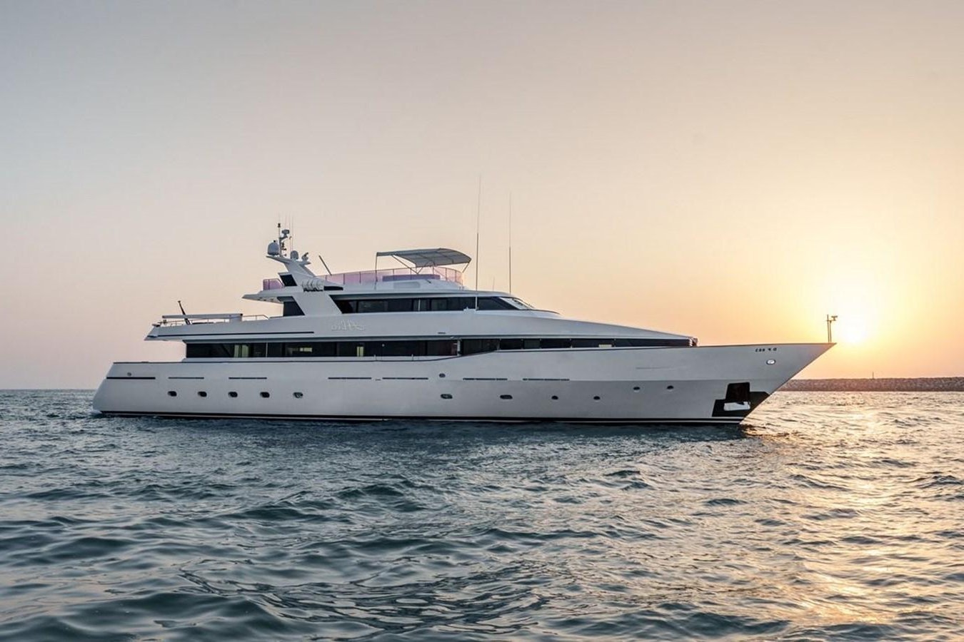 a white yacht in the water aboard ALIA 7 Yacht for Sale