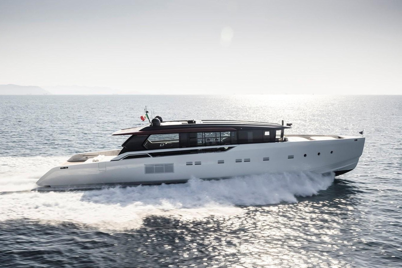 a white yacht in the water aboard ANMAX Yacht for Sale