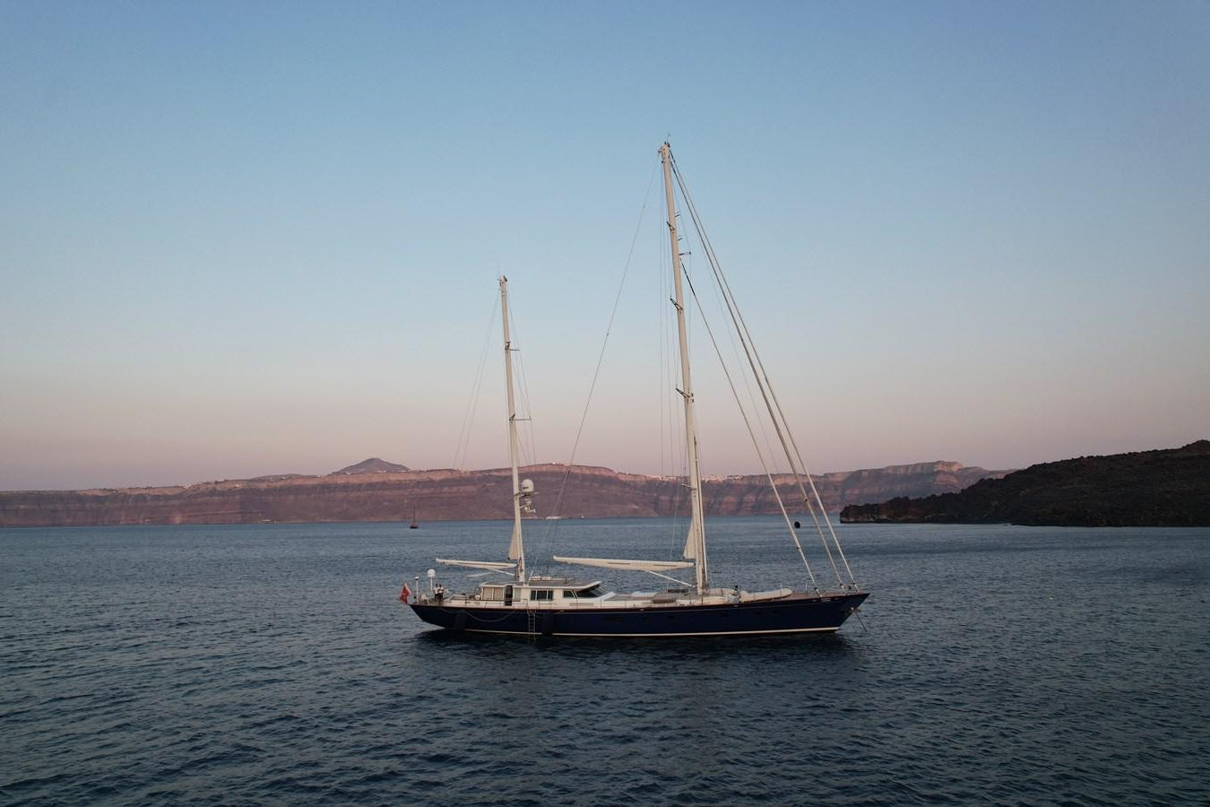 a sailboat on the water aboard CYRANO DE BERGERAC Yacht for Sale