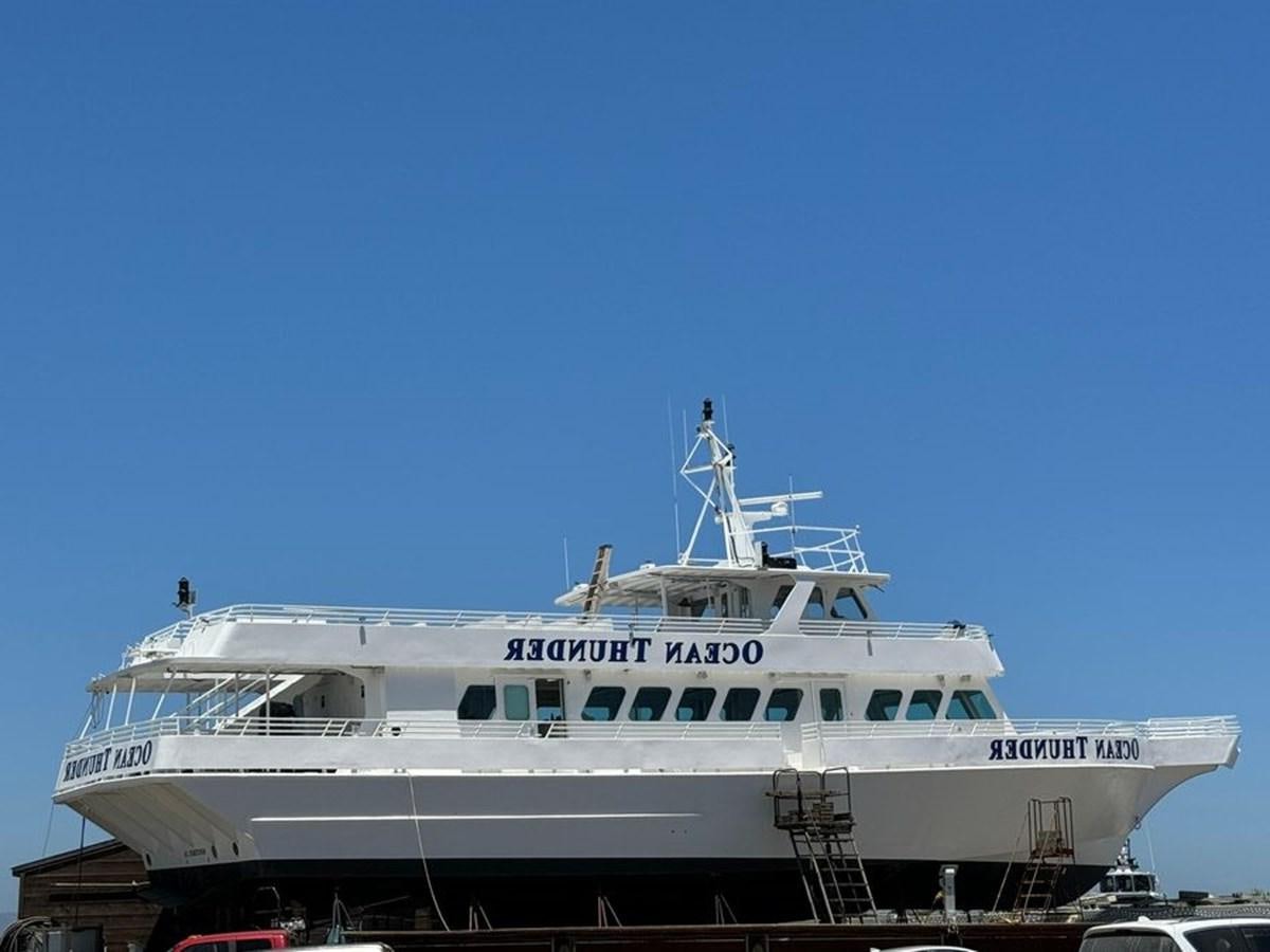 a large white boat aboard OCEAN THUNDER Yacht for Sale