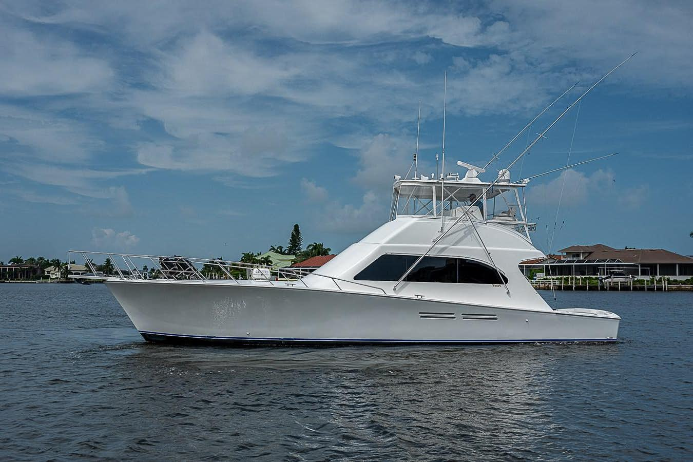 a white boat on the water aboard BAMBOOSHAY II Yacht for Sale