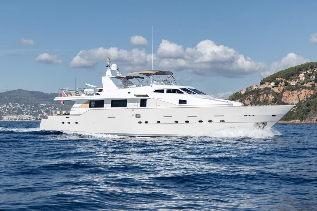 a white yacht in the water aboard MOONRAKER II Yacht for Sale