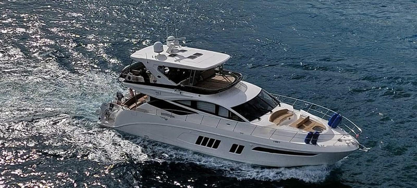 a boat in the water aboard SEA RAY L650 FLY Yacht for Sale