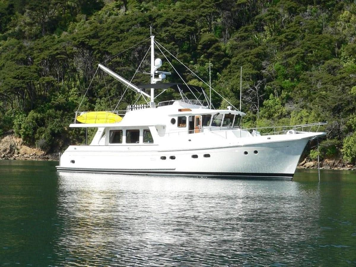 a white boat on water aboard GRAPE ESCAPE Yacht for Sale